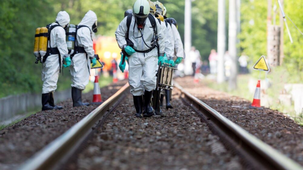 Disaster Recovery Workers near a train rail